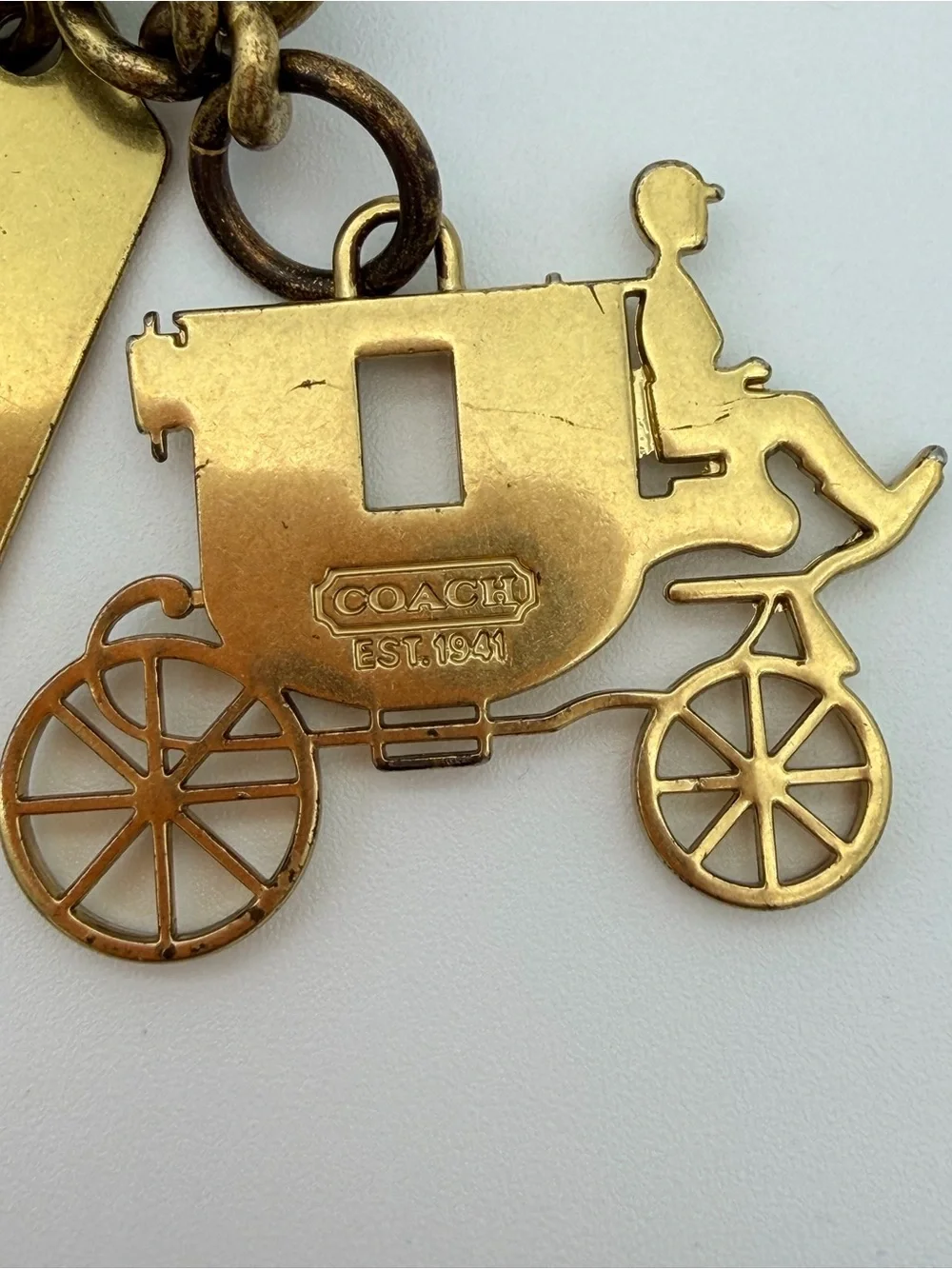 COACH Brass Charm Bracelet with Coach Tags & Horse Carriage Charm
